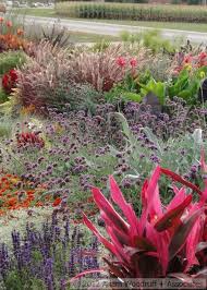 22 0000 Sq Ft Garden Installed By Adam Woodruff In Front Of A Bank In Il Springfield S Late Mayor Called Flowers Perennials Garden Great Ideas Garden Design