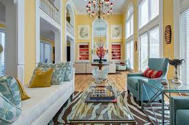 Santoro living room set blue luxurious button tufted leather sofa set with yellow accent pillows, blue and yellow wall art and a blue, gray & yellow rug. Yellow And Blue Interiors Living Rooms Bedrooms Kitchens