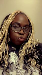 Bathroom with a tv in its mirror.