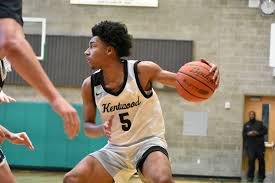 Kentwood basketball pulls away late against Curtis