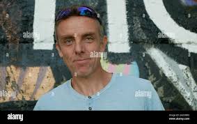 Michael Esson artisan portrait of a fine art, painter and collage artist  celebrity, member Extinction Rebellion climate emergency