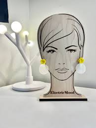 Pendientes holográficos con efecto iridiscente de aurora boreal y postes de  nudos con cuentas amarillas