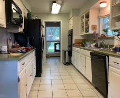 To define the space above cabinets and balance out the room, install kitchen soffits. Orc Budget Kitchen Makeover Removing Soffits And Sheetrock Patching House Homemade
