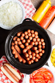 How long does it take to boil 2 hot dogs? Slow Cooker Hot Dogs The Magical Slow Cooker