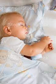 Cute Little Baby Boy Sleeping With Bottle With Formula Milk Stock Photo Download Image Now Istock
