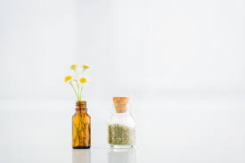 Dried herbs and flowers near me. Corked Jar With Dried Herbs Near Glass Bottle With Chamomile Flowers On White Background With Copy Space Free Stock Photo And Image