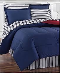 The red bedding set features a dark gray neutral sheet set that help tone down the look of the deep red comforter for a perfectly contrasted look. Red Blue Reversible Nautical Bedding Set Bed In A Bag