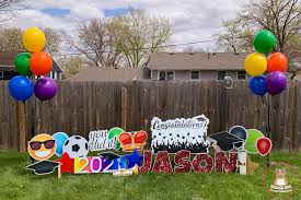 Our service includes personalization, selected graphics, stars and balloons, setup and removal. Celebrate Your Child S Graduation With A Graduation Yard Card Display Smiling Dog Entertainment