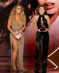 Miley Cyrus Grammys dress was made of loads of gold safety pins - ABC News