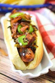 Caramelized Bourbon Glazed Onions Bacon On This Bourbon Onion Bacon Dog Is The Perfect Hotdog To Serve For National Hotdo Bacon Dog Hot Dog Toppings Hot Dogs