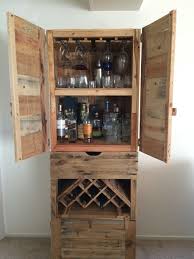After selecting a site and deciding how large it needs to be, the next step in how to build a liquor cabinet is to gather supplies. My Liquor Cabinet Is Finally Finished Every Pic On This Board Contributed To The Making Of This Wine And Liquor Cabinets Wine Cabinet Diy Wine Cabinet Design