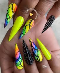 Stiletto nails are popular among many celebrities. Stylish Belles Cute Neon Yellow Stiletto Nails With Mixed Neon