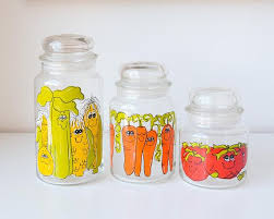 Save big on apothecary jars, mercury glass vases, glass candy jars with lids, and glass centerpieces. Hildi Designed Anchor Hocking Glass Canisters Vintage Glass Jars Vegetable Character Design Corn Carrots Tomatoes Set Of Three Glass Canisters Glass Jars Jar Design