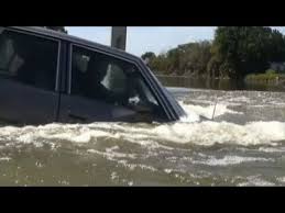what to do: car sinking in water, only