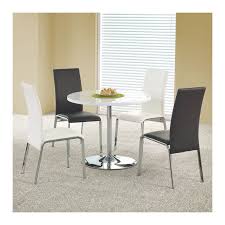 Dans le commerce traditionnel, le design coûte cher et. Table De Cuisine Ronde Blanche Laquee Avec Un Pied En Acier Chrome