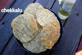 Chekkalu Recipe Pappu Chekkalu Andhra Style Spice Rice Cracker Recipe Recipes Spiced Rice Indian Snack Recipes