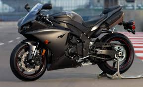 A limited edition semi race spec variant, with fuel injection tweaks, special ohlins suspension, top end work to squeeze another 3bhp from the motor and matt black paint. 2013 Yamaha Yzf R1
