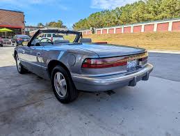 Image result for Light Driftwood 1990 Buick
