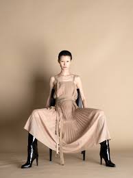 PLEATED DRESS WITH RUFFLE HEM – BY. Bonnie Young