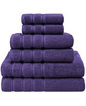 Charming purple powder room is clad in purple grasscloth wallpaper illuminated by a gold bamboo flush mount fixed to a wallpapered ceiling. Purple Bath Towels Macy S