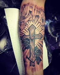 Cross tattoos have been popular ever since tattoos have been put on the skin of human beings across the world! 225 Best Cross Tattoo Designs With Meanings