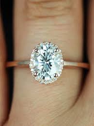 How To Make Your Engagement Ring Look Bigger Yes Really Minimalist Engagement Ring Pave Halo Engagement Ring Engagement Rings