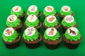 The Jungle Book Cupcakes Creation Little Petits Gateaux Credit Photo Asphodel Sweet Table Jungle In 2019 Jungle Book Party Book Cupcakes Birthday
