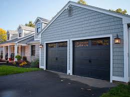 The garage door tracks are much closer to the door frame at the bottom than at the top of the frame. Reviews Anytime Garage Doors