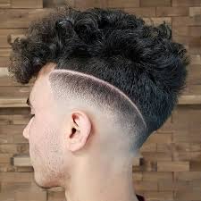 A drop fade gets its name from the fact that its fade disappears behind the ears. 15 Trendy Men Haircuts For Naturally Curly Hair Styleoholic