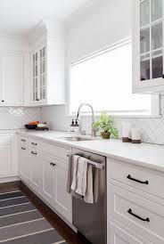 Shaker Kitchen Cabinets With Simple Herringbone Subway Tile And White Marble Countert Shaker Style Kitchen Cabinets Kitchen Cabinet Styles White Shaker Kitchen