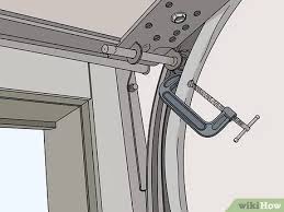 This is caused by moisture found on the bottom of the garage door cables. Easy Ways To Adjust Garage Door Cables 9 Steps With Pictures