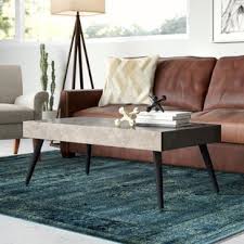 A polished round of solid active with hi/lo tones, each piece of quartz is unique. Quartz Coffee Table