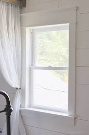 I nailed it in with my air gun, caulked the tops and outsides only, primed, and 2. Farmhouse Window Trim Love Grows Wild