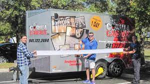 The my gorilla garage floor coating system is ideal for homeowners and businesses that want to have a concrete floor covering. Ribbon Cutting My Gorilla Garage Llc Bradenton Herald