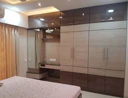 Modern bedroom cupboard design (cupboard with drawer) cupboard with drawer is a designer with wooden and white laminate with big size stainless steel handles. Login Bedroomwardrobe Wardrobe Laminate Design Wardrobe Design Bedroom Bedroom Cupboard Designs