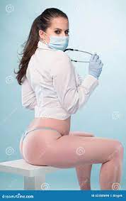 Nurse in Shirt and Panties Sitting on a Stool Stock Photo - Image of  brunette, shoulder: 52358698