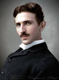 Nikola Tesla (1856-1943), Serbian (later naturalized American) physicist  from Croatia, sitting in his Colorado Springs laboratory with his  "magnifying transmitter" in 1899.