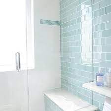 Get the best deals on glass bathroom floor & wall tiles. Master Bathroom Shower Features A Rain Shower Head Suspended Over Gray Subway Tiles As Well As A Marble Hex Glass Tile Shower Bathroom Colors Cottage Bathroom