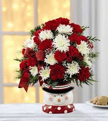The Ftd Snowman Sensation Bouquet Blooms Today Christmas Flower Arrangements Christmas Arrangements Christmas Flowers