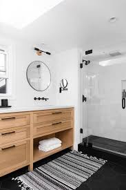 Black Bathroom Vanity With Marble Top Bathroom Rift Oak Vanity With White Marble Top Black Matte Hardware Black Round Mirrors Accent In 2020 Black Tile Bathrooms Black Bathroom Floor White Marble Bathrooms