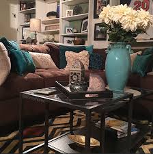 Cozy Brown Couch With Teal Accents Turquoise And Brown Built In Shelves Ikea Nesting T Brown Living Room Decor Living Room Turquoise Brown Couch Living Room