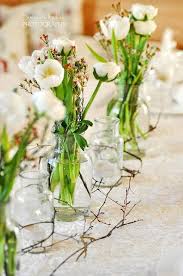 Our table arrangement collections are sure to impress anyone. A Row Of Sweet And Simple Flower Arrangements For The Dining Table Flower Decorations Flower Centerpieces Flower Arrangements