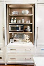 Foldaway board looks like a simply slide the cabinet door open and lift the board to the full upright position. Fold In Kitchen Cabinet Doors Transitional Kitchen