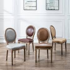 Round back dining chairs come in different styles from classic velvet materials to upholstered seats. Art Leon Vintage Faux Leather Round Back Wood Dining Chairs Set Of 2 Overstock 27988690