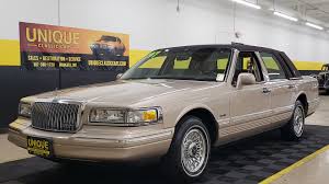 Image result for Light Prairie Tan 1998 Town Car