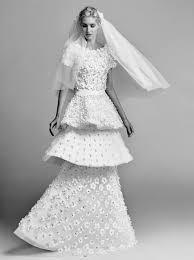 This captivating wedding dress, covered with intricate geometric beadwork and appliques, is designed for the bold bride who dares to dazzle. The 11 Best Wedding Dresses For Fall 2017 Fashionista