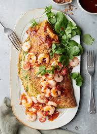 Keep it simple and wholesome or be as dramatic and over the top as you dare. Rice Noodle And Coriander Omelette With Chili Prawns Dish Dish Magazine