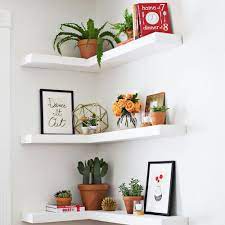 These floating corner shelves would be absolutely perfect in any corner space a recurring theme with really effective storage for small spaces seems to be that it is off the ground. 8 Corner Storage Solutions To Rule Your Small Space Brit Co