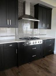 Pin By Ashley Horton On For The Home Kitchen Design Home Kitchens Dark Kitchen Cabinets