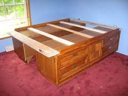 This captain bed in full size is easy to build without pocket holes or plywood! How To Build A Captain S Bed From Two Dressers Diy Storage Bed Captains Bed Diy Bed